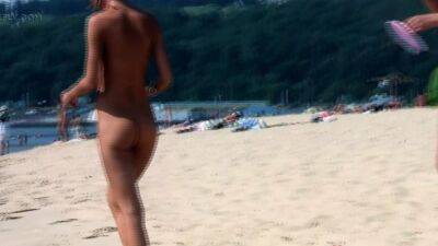 Bombastic young nudist babes sunbathe nude at the beach - drtuber.com