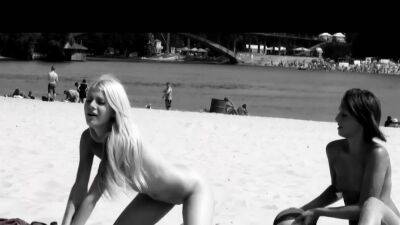 Wicked young nudist enjoying herself on the beach - drtuber.com